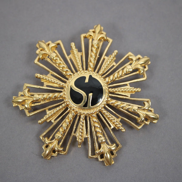 St John Black Enamel Goldtone Filigree Starburst Logo 2.5" Pin