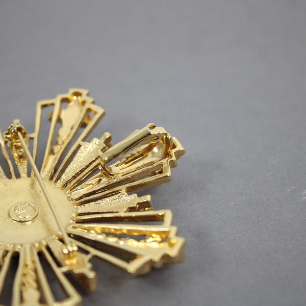 St John Black Enamel Goldtone Filigree Starburst Logo 2.5" Pin