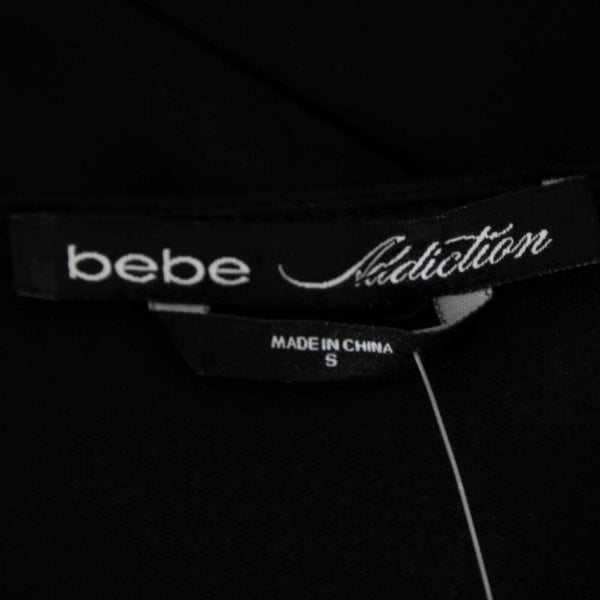 Bebe Addiction NEW Kerra Sz S Black White Zip Side Open Side Poly Spandex Dress