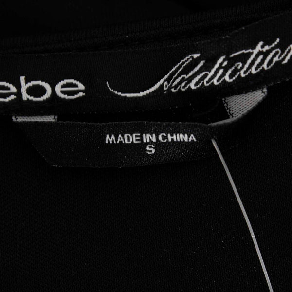Bebe Addiction NEW Kerra Sz S Black White Zip Side Open Side Poly Spandex Dress