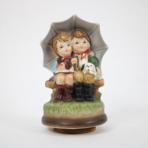 Made in Japan Boy And Girl With Puppy Hand Painted Pottery 7" Music Figurine