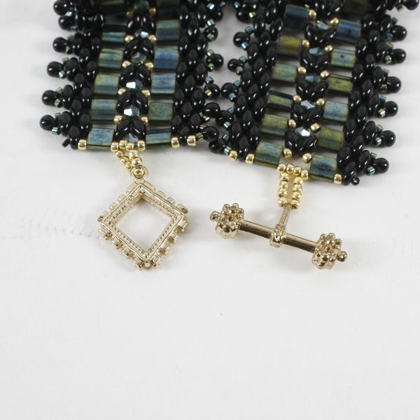 Unbranded Sz 8 x 1.5in Black Green Goldtone Glass Bead Toggle Bracelet