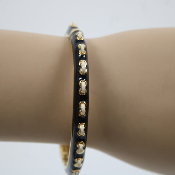 St John Goldtone Hardware Black Cream Enamel Push Lock Bangle Bracelet