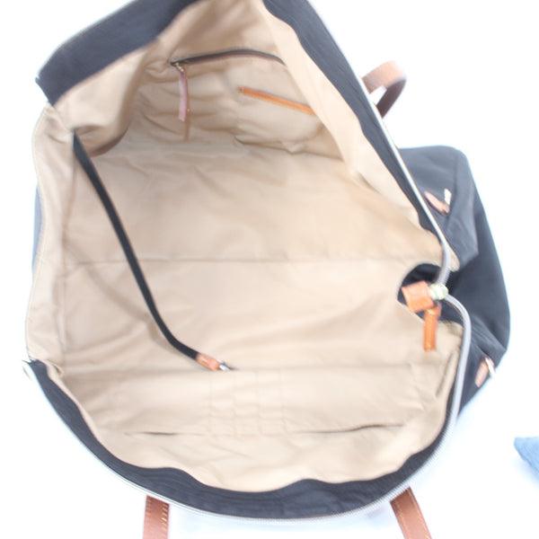 Dooney Bourke Duffle 18 x 10 x 10 Black Tan Inner Pockets Canvas Leather Tote