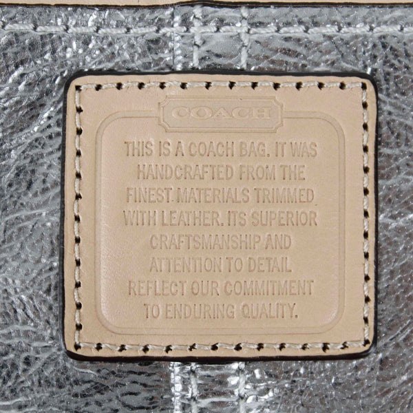 Coach 6 x 10 x .5 Silver Tan Leather Zip Top Inside Pockets Wristlet