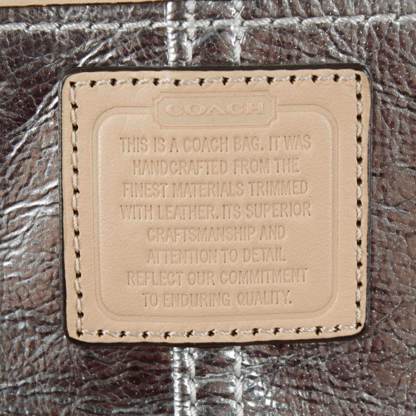 Coach 6 x 10 x .5 Silver Tan Leather Zip Top Inside Pockets Wristlet